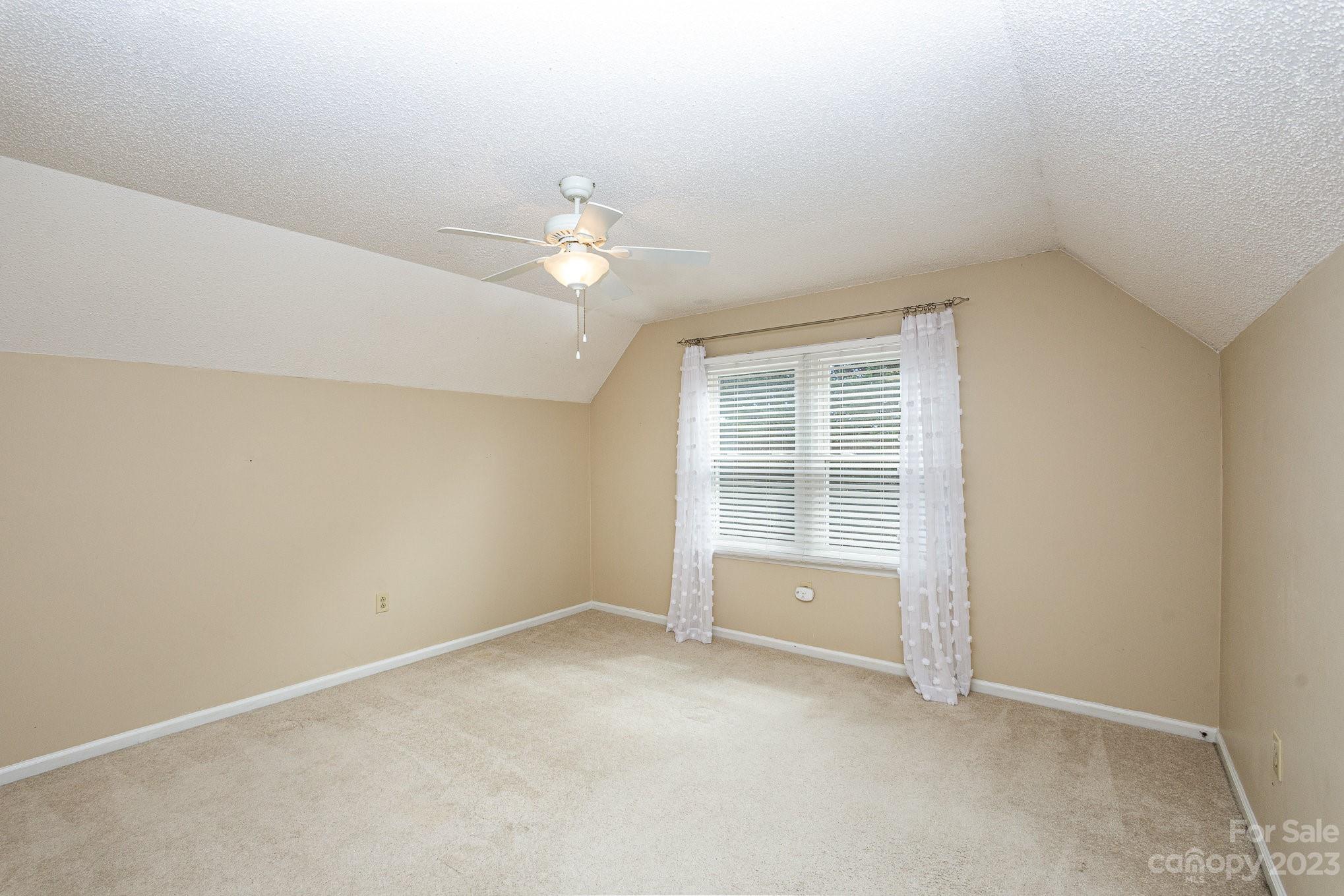 15531 Stumptown Road Huntersville, NC 28078 - Photo 25 of 35 an empty room with a window