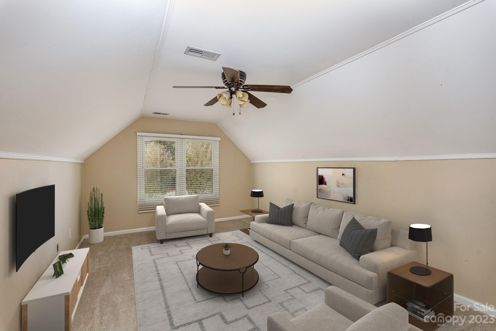 15531 Stumptown Road Huntersville, NC 28078 - Photo 28 of 35 a living room with furniture a flat screen tv and a window