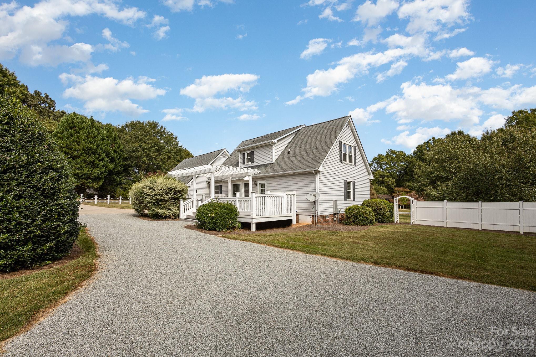 15531 Stumptown Road Huntersville, NC 28078 - Photo 9 of 35 a view of a house with a street