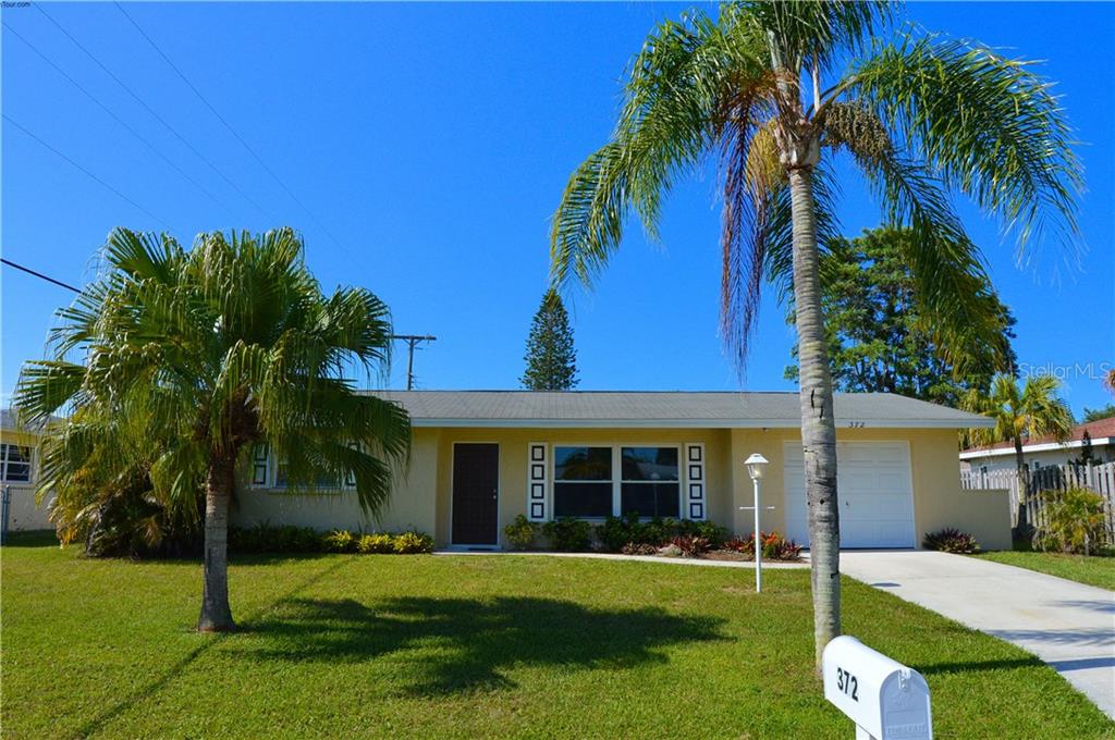 372 Sea Grape Road Venice, FL 34293 - Photo 1 of 1 front view of a house with a yard