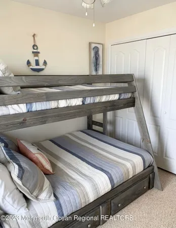 a view of bedroom with furniture