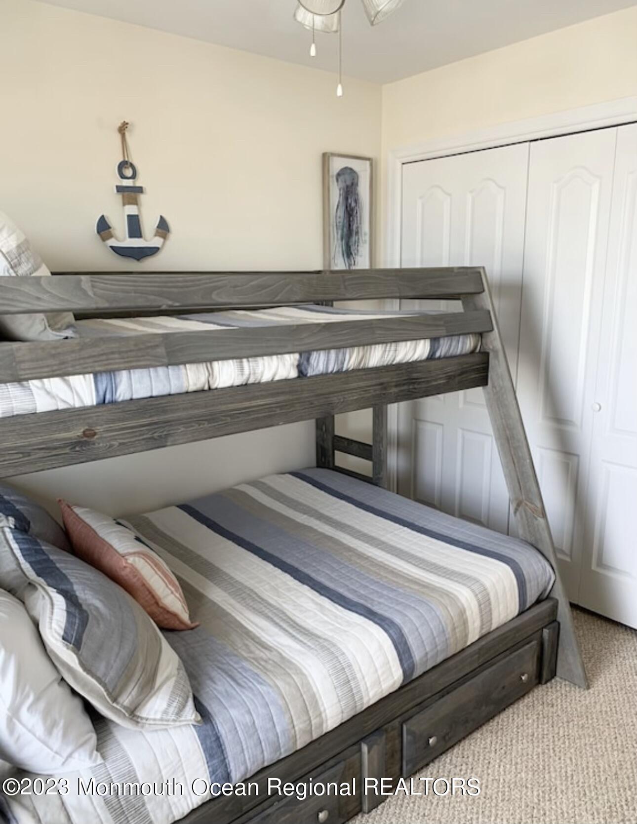 1301 Ocean Boulevard, Unit 10 Seaside Heights, NJ 08751 - Photo 10 of 13 a view of bedroom with furniture