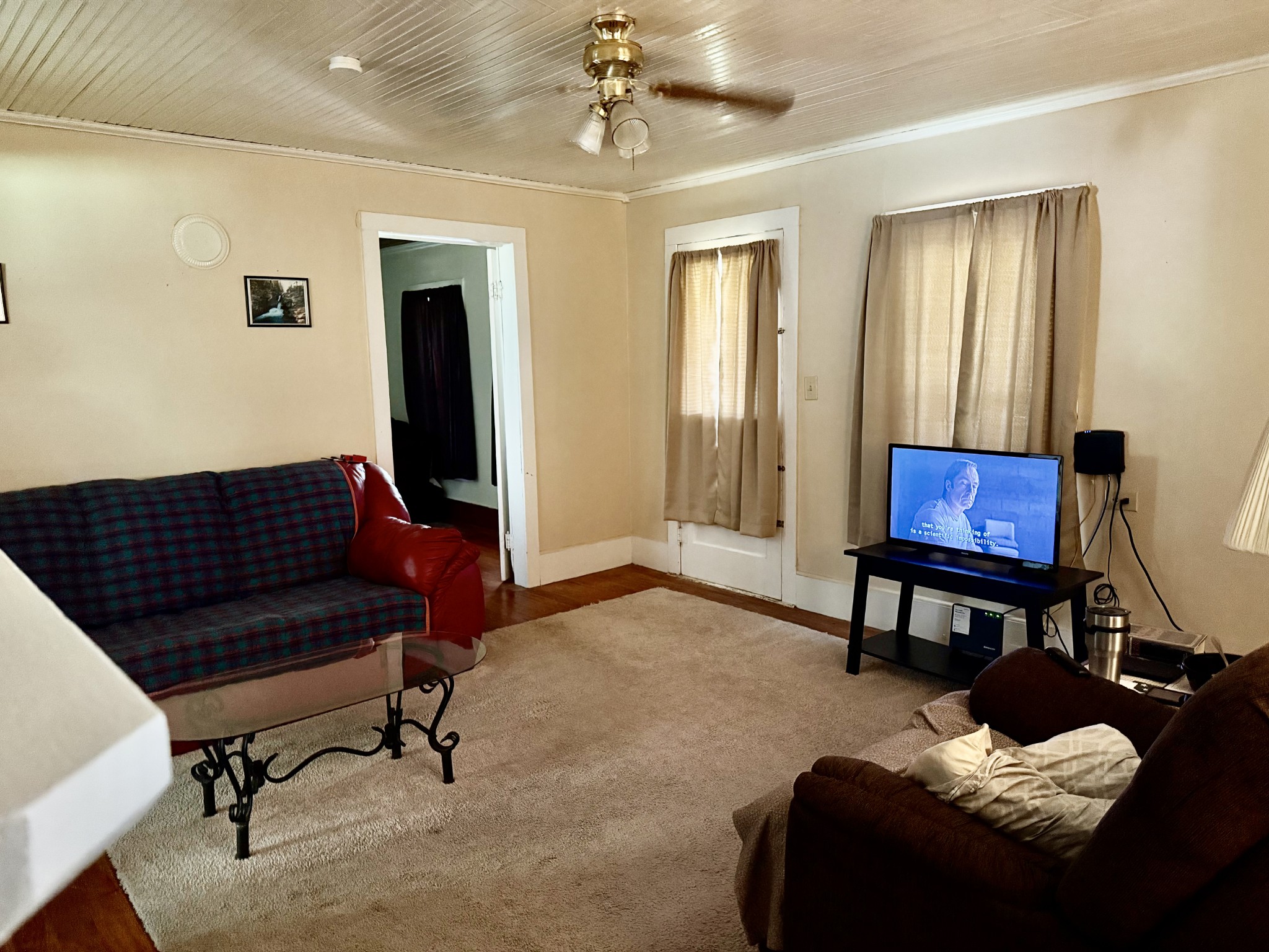 21625 Seminary Street Hollow Rock, TN 38342 - Photo 11 of 19 a living room with furniture and a potted plant