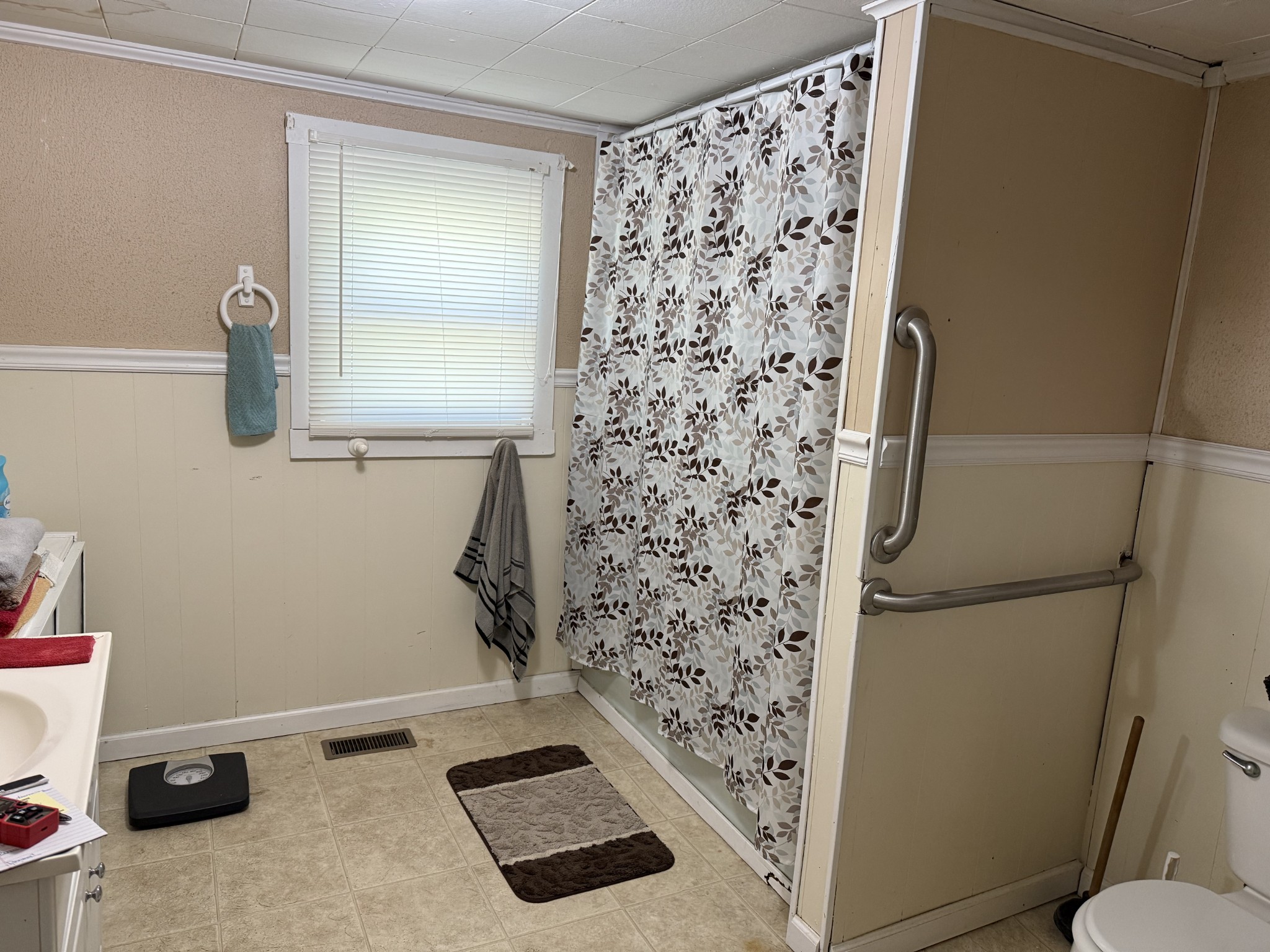 21625 Seminary Street Hollow Rock, TN 38342 - Photo 10 of 19 a bathroom with a shower and a sink
