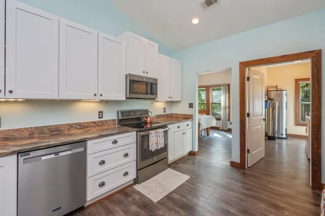 a large kitchen with cabinets