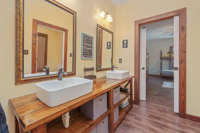 a en suite bathroom with a sink and a mirror