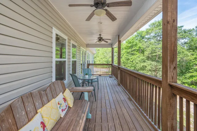 a view of balcony with furniture