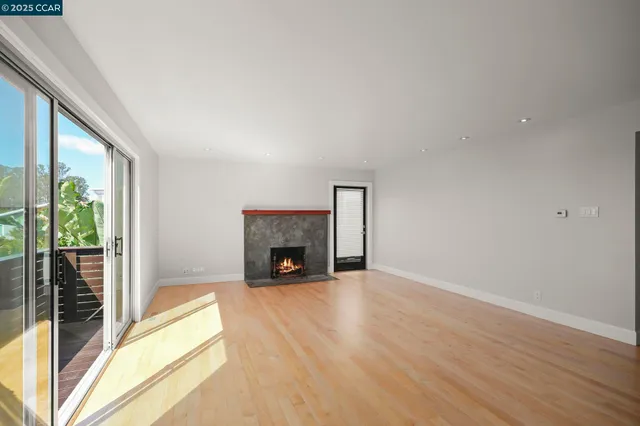 a kitchen with stainless steel appliances granite countertop a sink and a stove