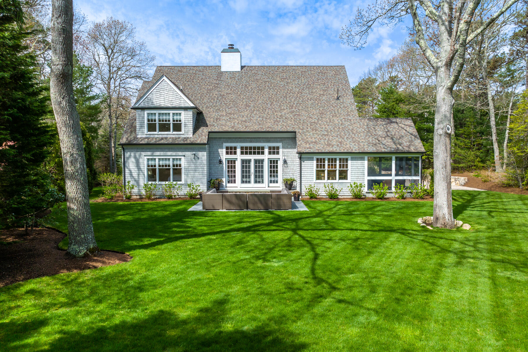 130 Eel River Road Osterville, MA 02655 - Photo 3 of 42 a view of a house with a yard and sitting area