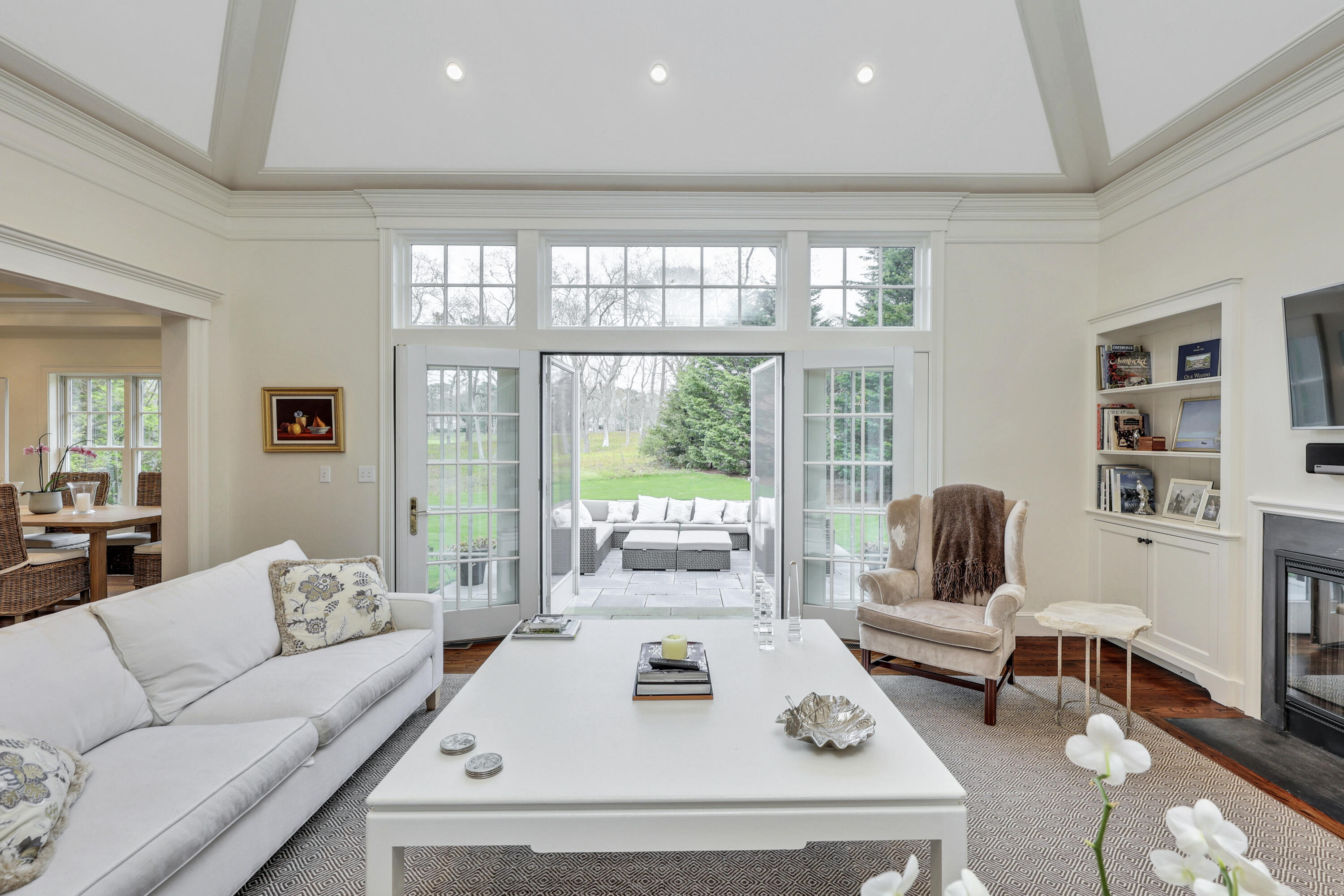 130 Eel River Road Osterville, MA 02655 - Photo 9 of 42 a living room with furniture and a large window