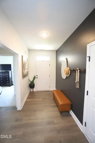 a view of a livingroom with wooden floor