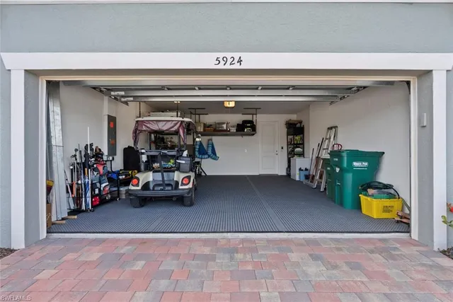 a view of a garage with cars