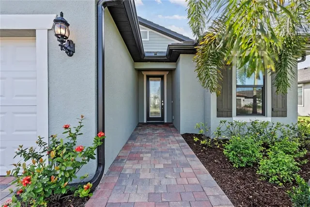 a view of a entryway with flower pots