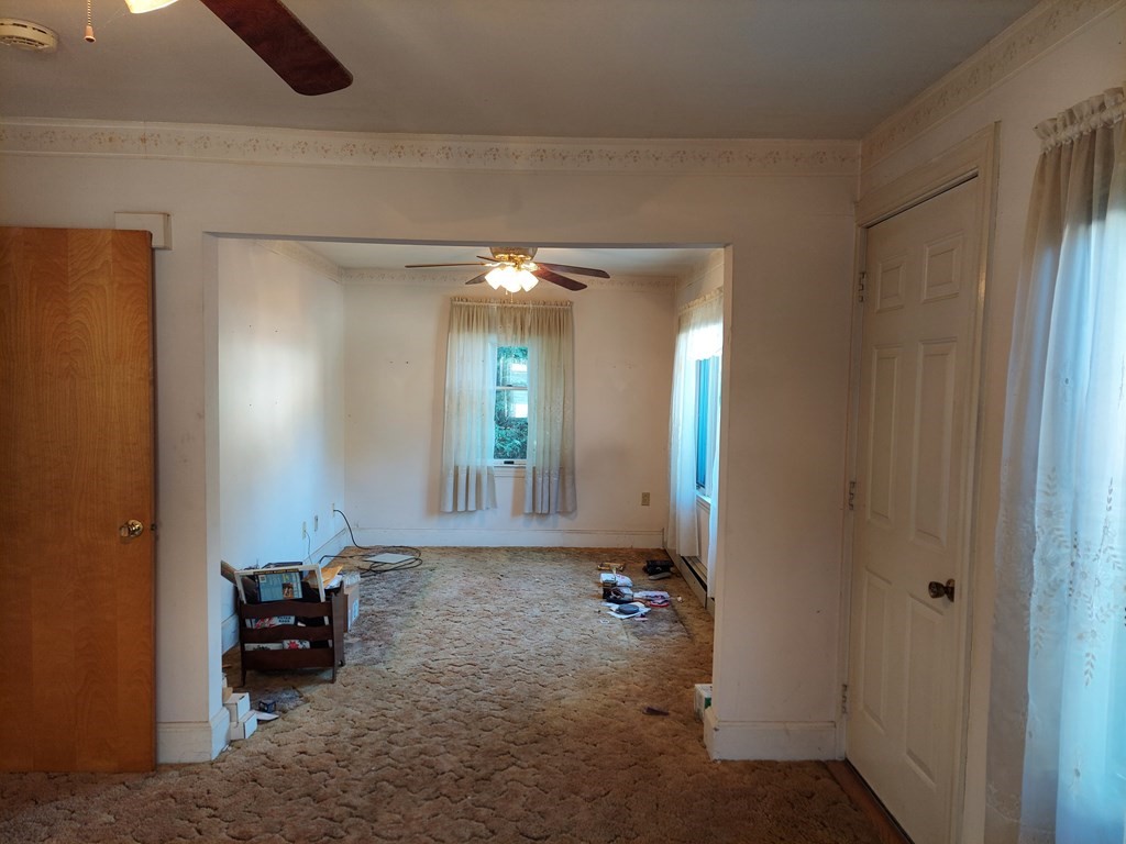 13 Saybrook Road Worcester, MA 01604 - Photo 11 of 40 a room with furniture and a chandelier