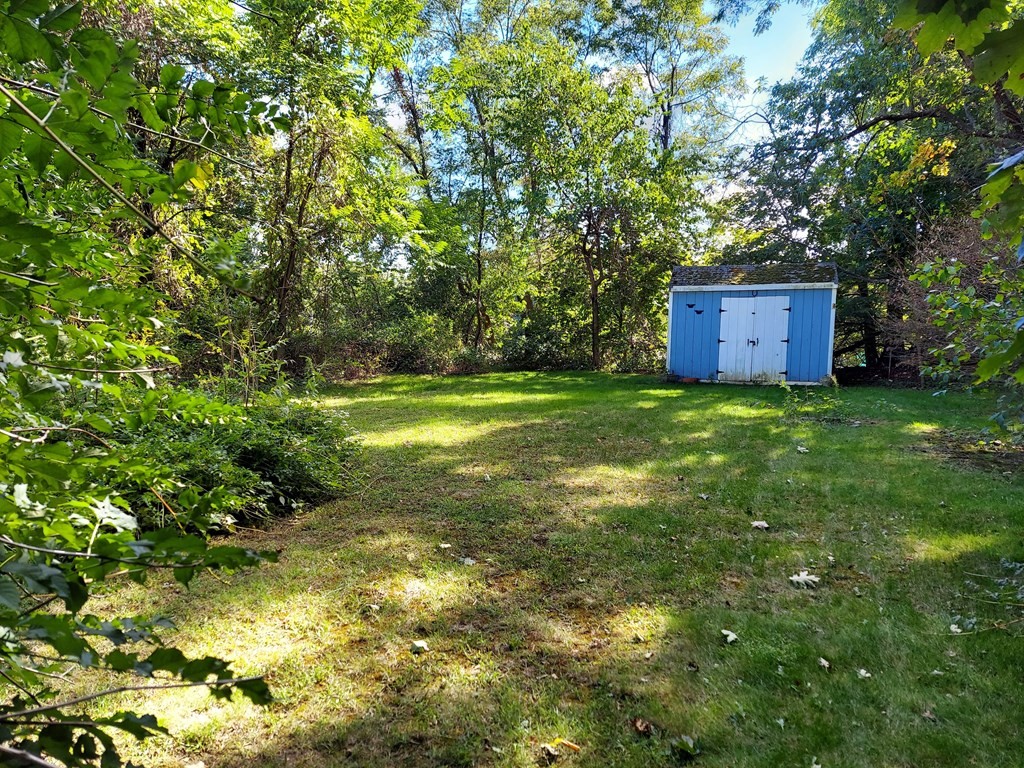 13 Saybrook Road Worcester, MA 01604 - Photo 31 of 40 a view of a big yard with large trees
