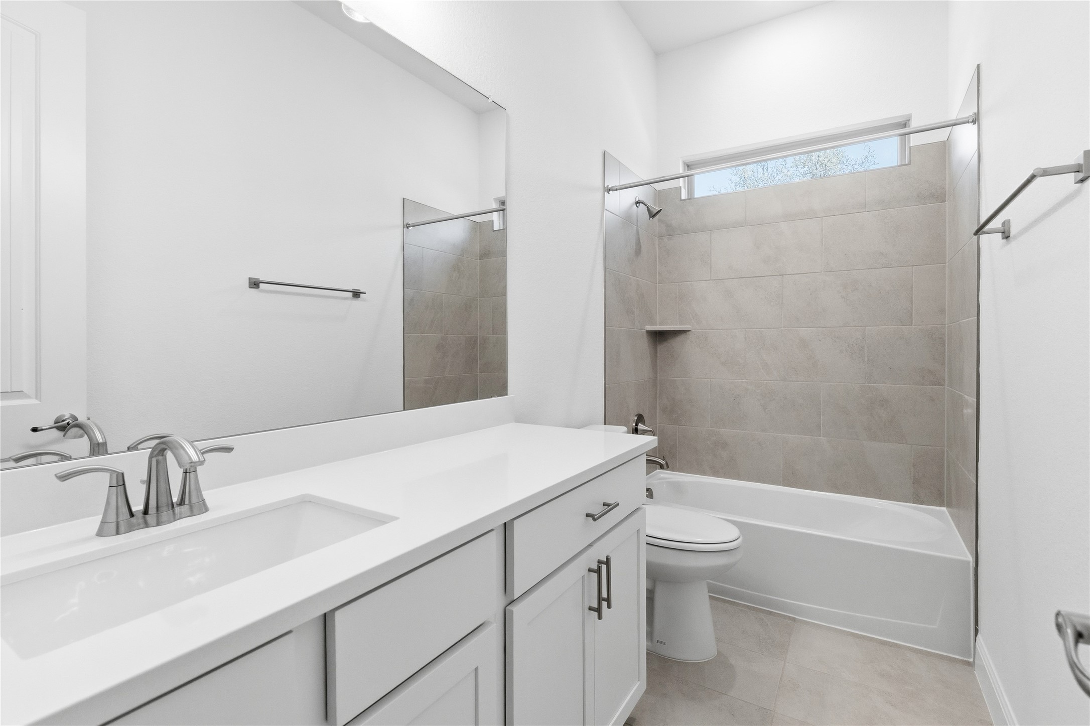 308 Frio Spgs Trail Georgetown, TX 78628 - Photo 23 of 32 a bathroom with a sink a toilet and a mirror
