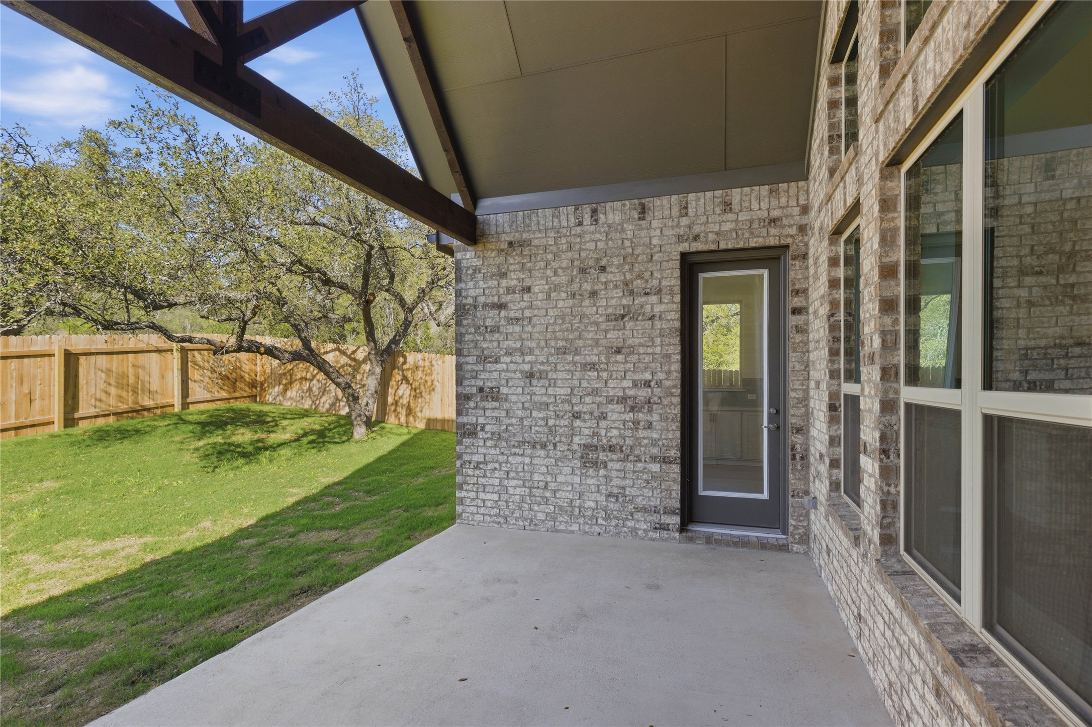 308 Frio Spgs Trail Georgetown, TX 78628 - Photo 29 of 32 a front view of a house with a garden
