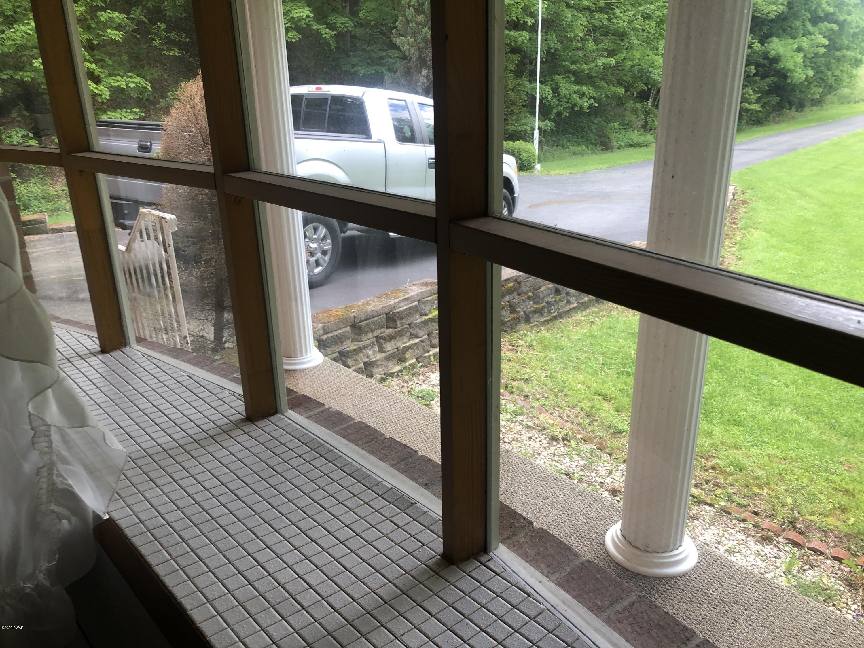 521 Perkins Pond Road Beach Lake, PA 18405 - Photo 10 of 27 Living Room Bow Window