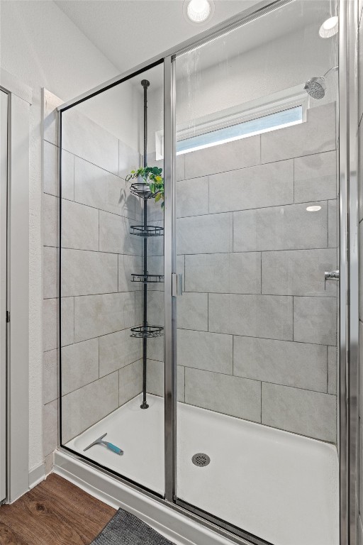 121 Tequilana Pass Leander, TX 78641 - Photo 18 of 39 a bathroom with a shower and a bath tub