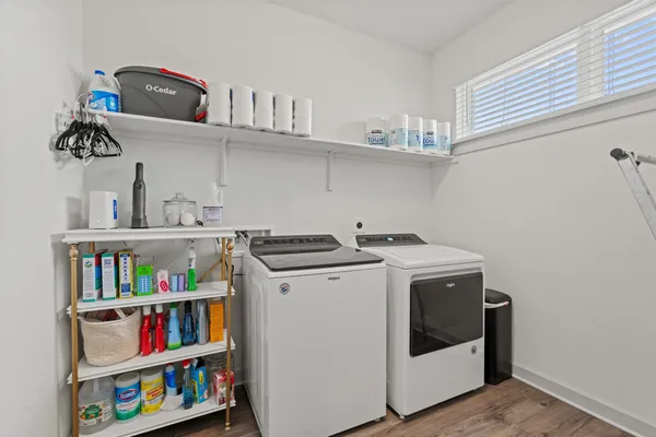 a utility room with dryer and washer