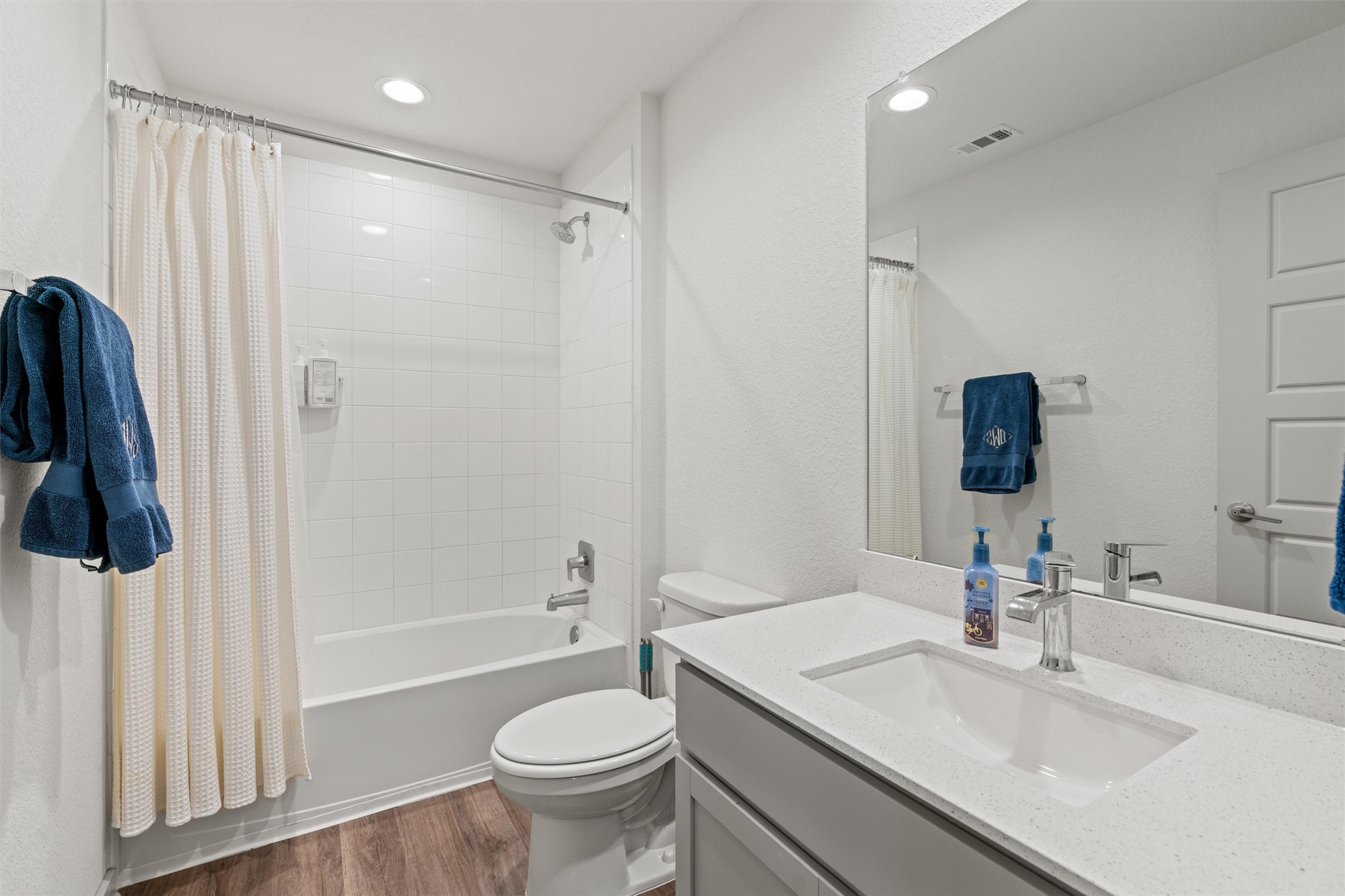 121 Tequilana Pass Leander, TX 78641 - Photo 32 of 39 a bathroom with a sink toilet and shower