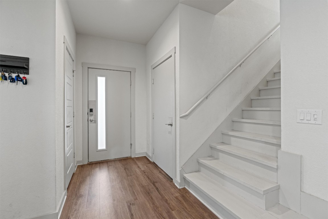 121 Tequilana Pass Leander, TX 78641 - Photo 4 of 39 a view of entryway with wooden floor