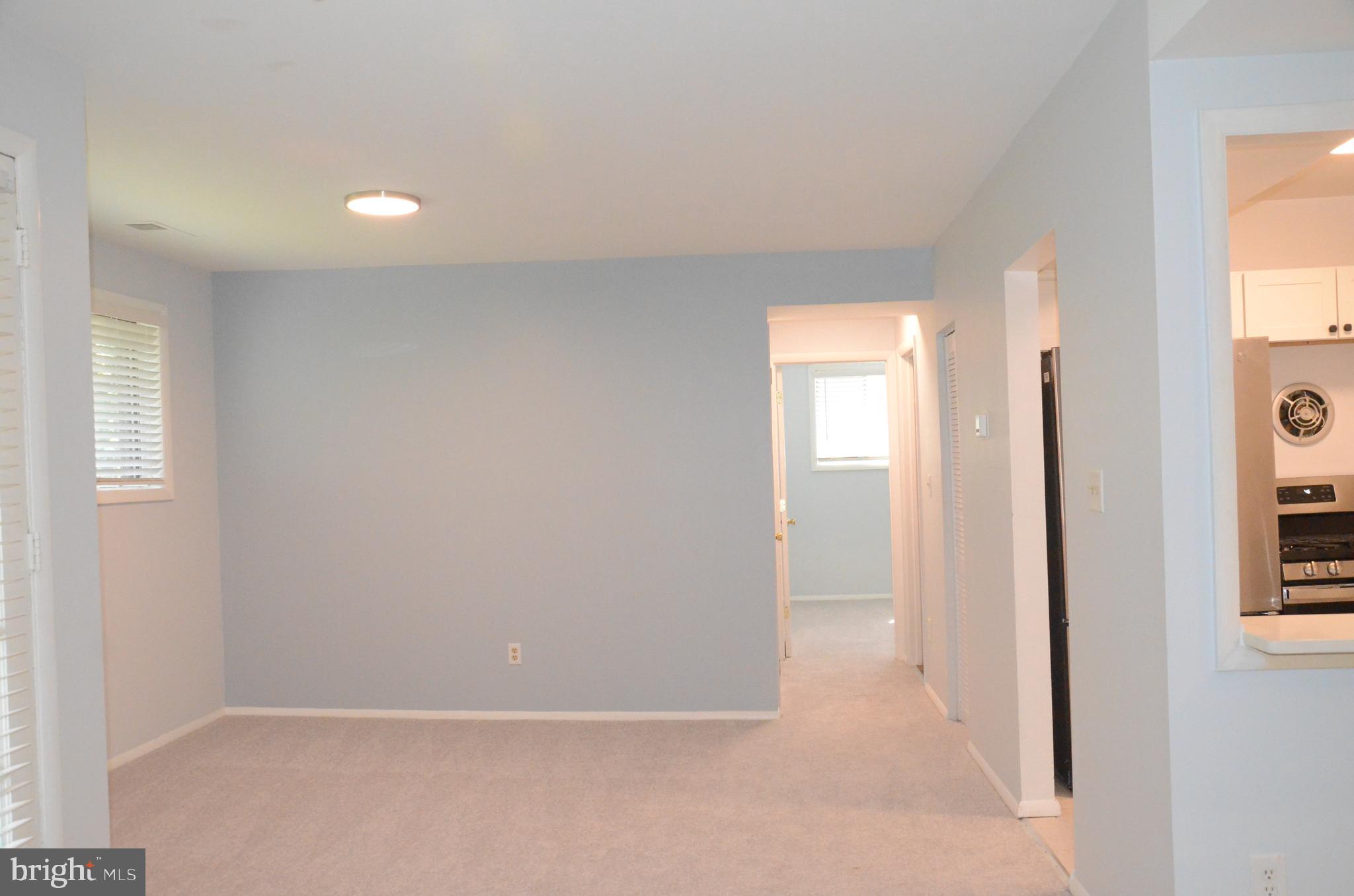521 Epsom Road, Unit 2D Towson, MD 21286 - Photo 11 of 28 Dining room into the kitchen
