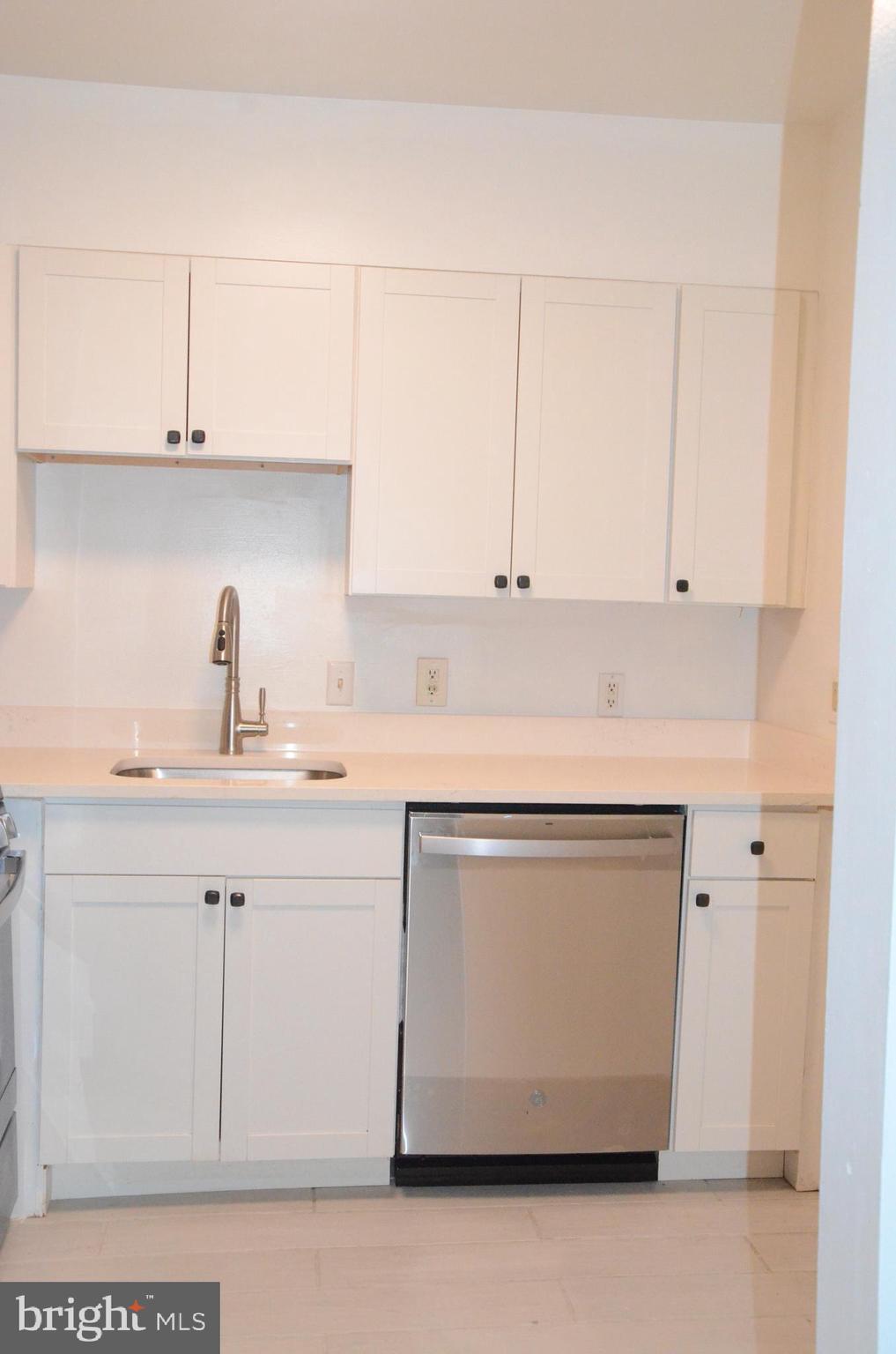 521 Epsom Road, Unit 2D Towson, MD 21286 - Photo 16 of 28 Lovely white cabinets great storage