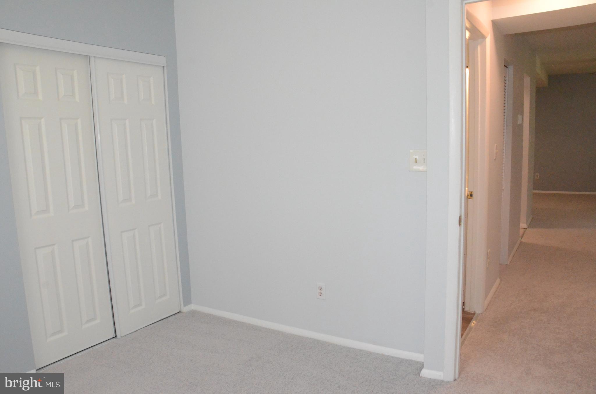 521 Epsom Road, Unit 2D Towson, MD 21286 - Photo 22 of 28 Two bedrooms windows have new blinds