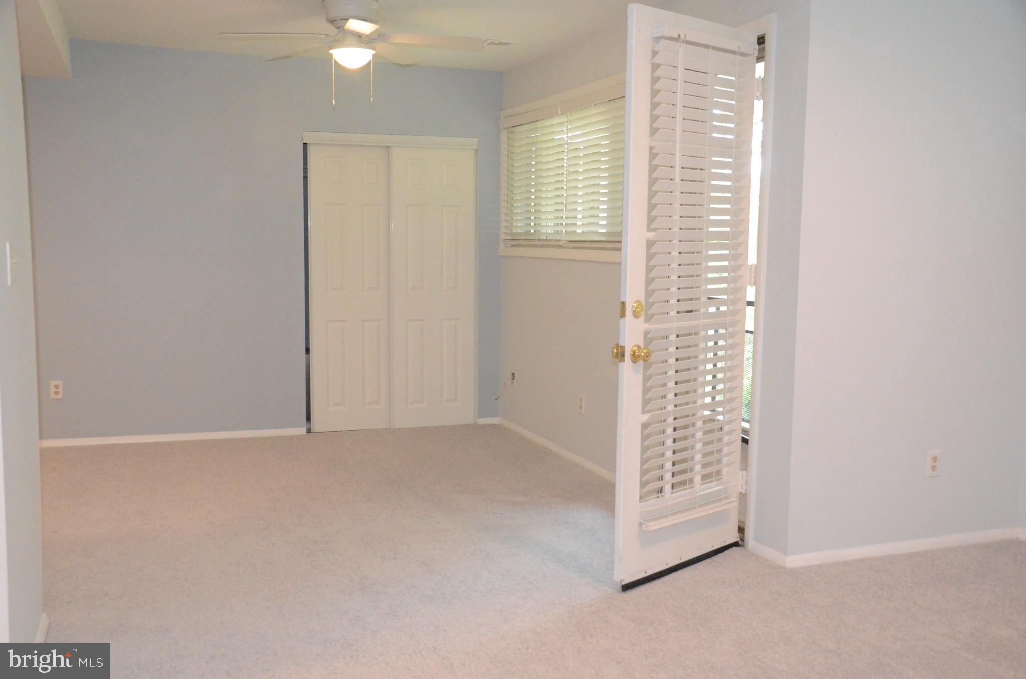 521 Epsom Road, Unit 2D Towson, MD 21286 - Photo 7 of 28 Easy access to private deck from the living room