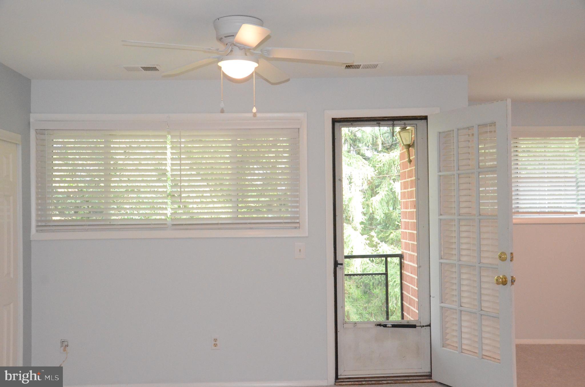 521 Epsom Road, Unit 2D Towson, MD 21286 - Photo 9 of 28 Ceiling fan in living room area