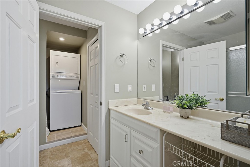 17432 Greenridge Road Hidden Valley Lake, CA 95467 - Photo 58 of 72 a bathroom with a double vanity sink and mirror