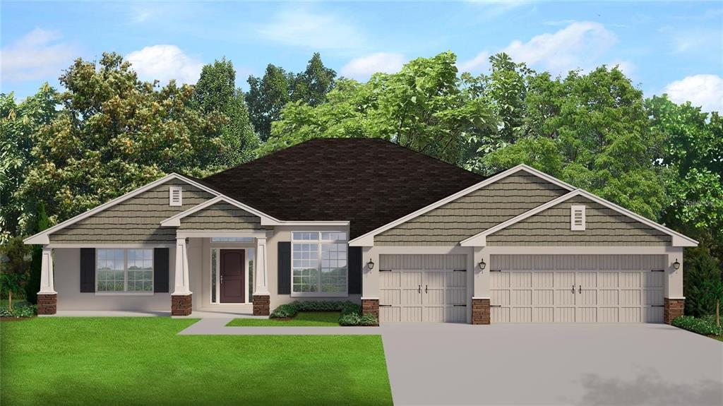 17805 Southwest 61st Ln Road Dunnellon, FL 34432 - Photo 1 of 1 a front view of a house with a yard and trees