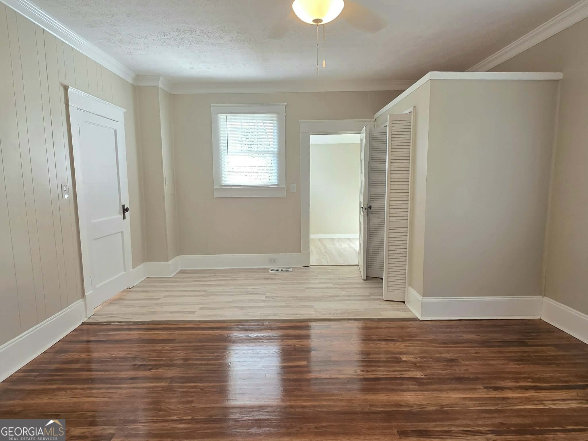 404 West Gordon Street Thomaston, GA 30286 - Photo 13 of 26 a view of empty room with wooden floor