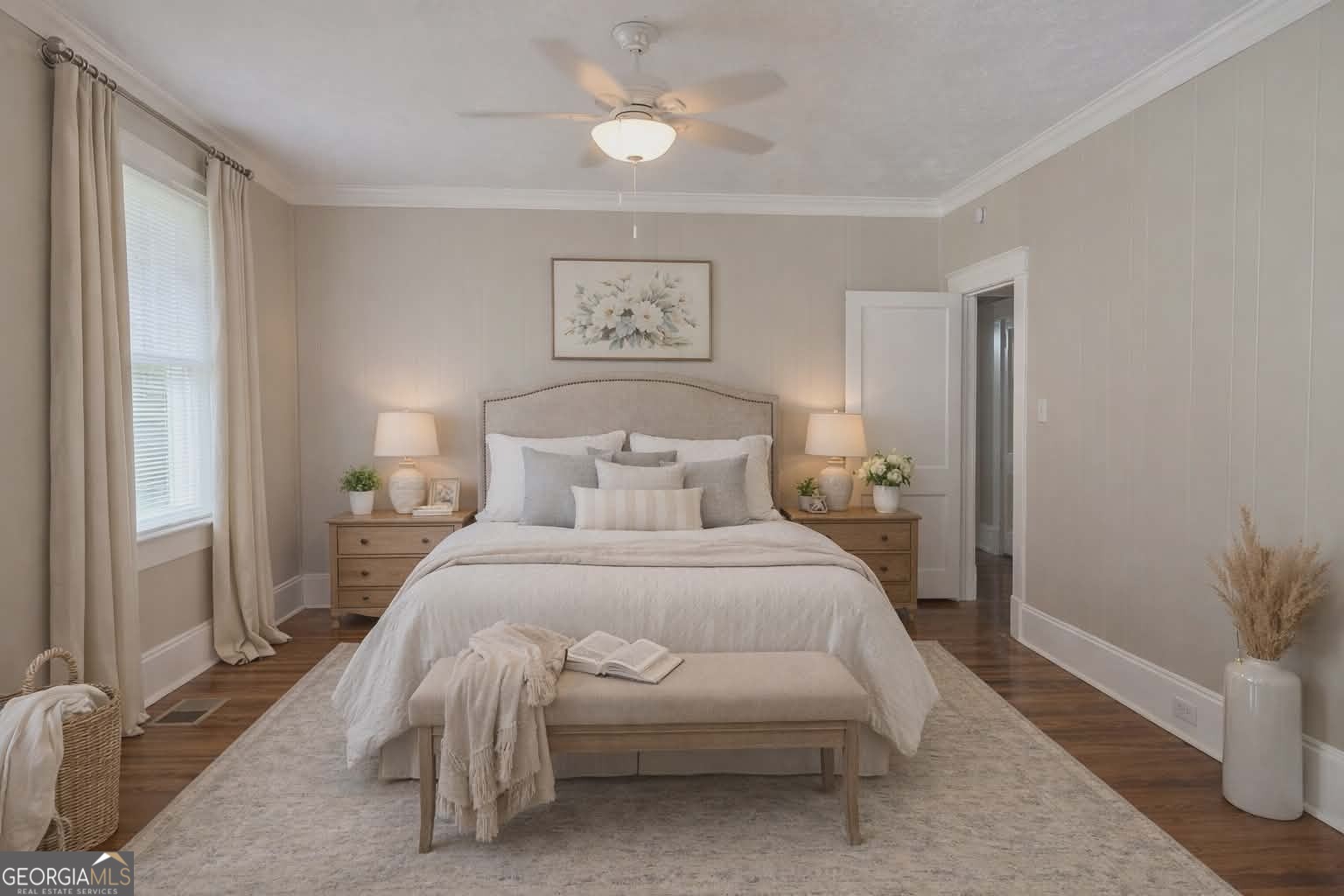 404 West Gordon Street Thomaston, GA 30286 - Photo 15 of 26 a bedroom with a bed and a potted plant