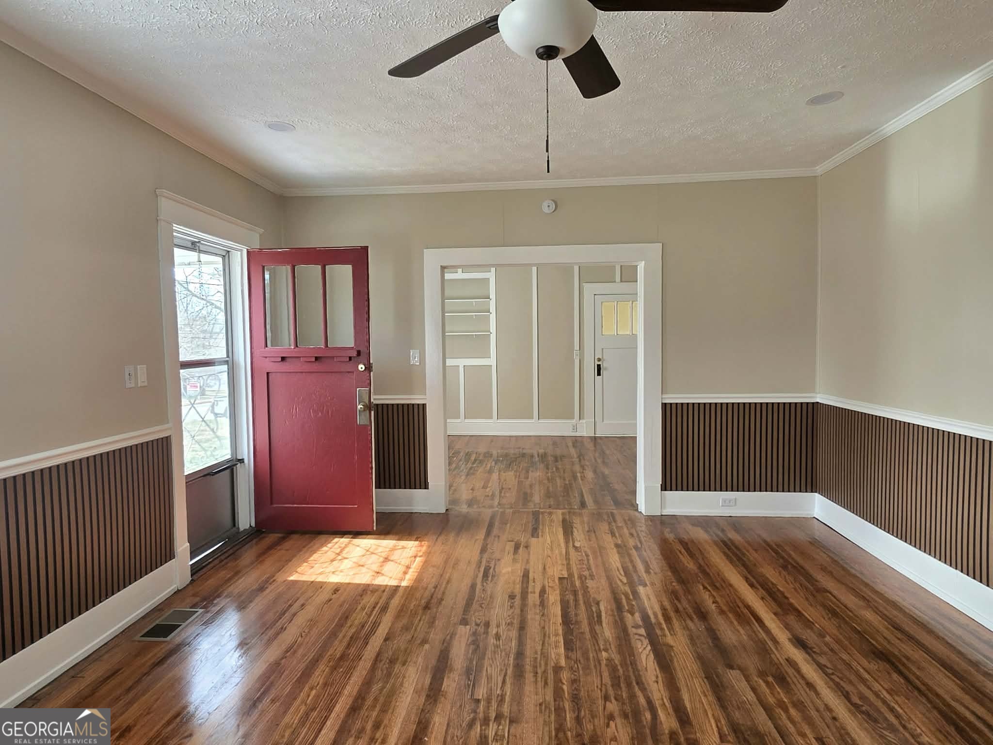 404 West Gordon Street Thomaston, GA 30286 - Photo 6 of 26 a view of hallway with wooden floor