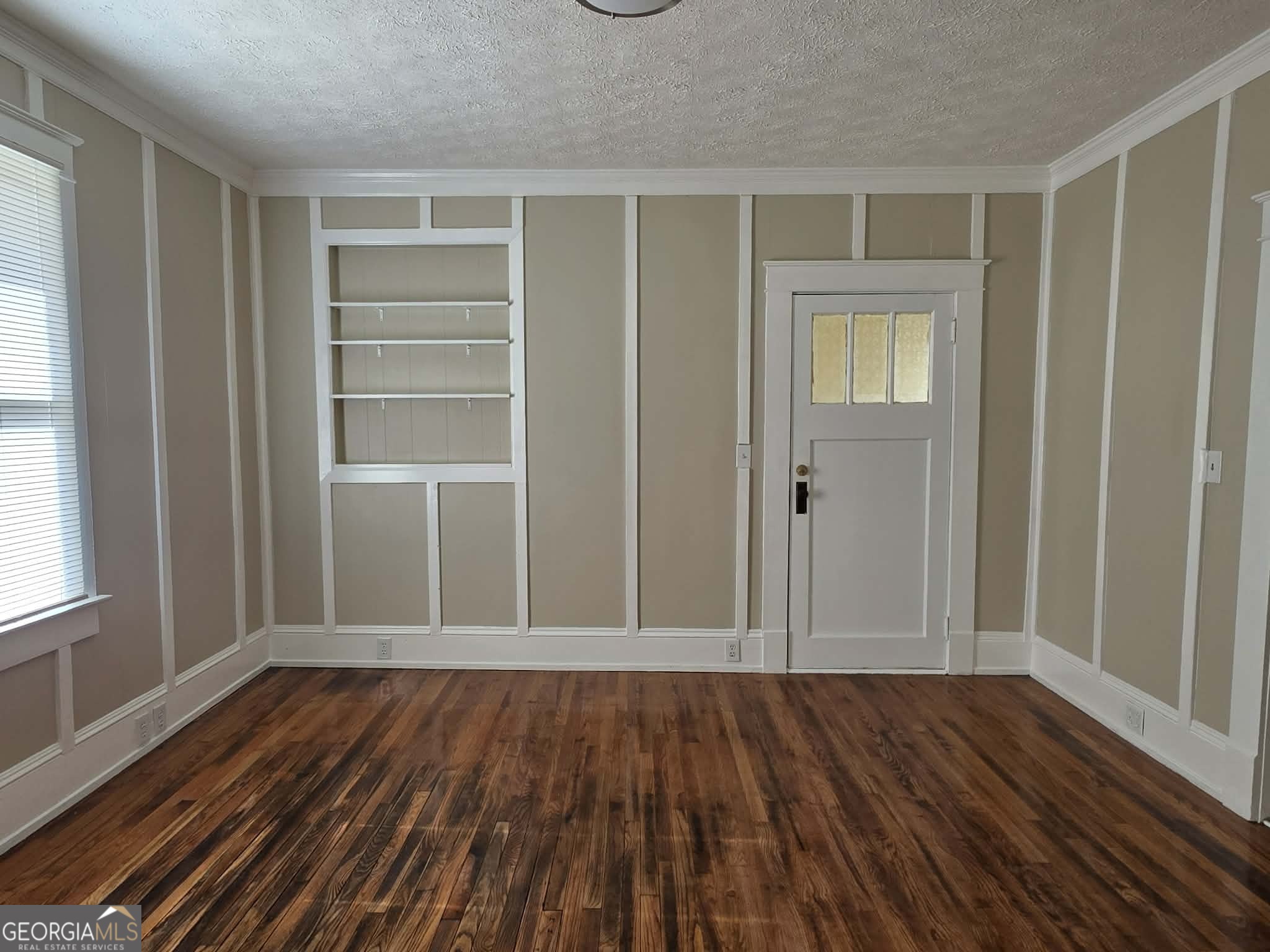 404 West Gordon Street Thomaston, GA 30286 - Photo 7 of 26 wooden floor and windows in a room