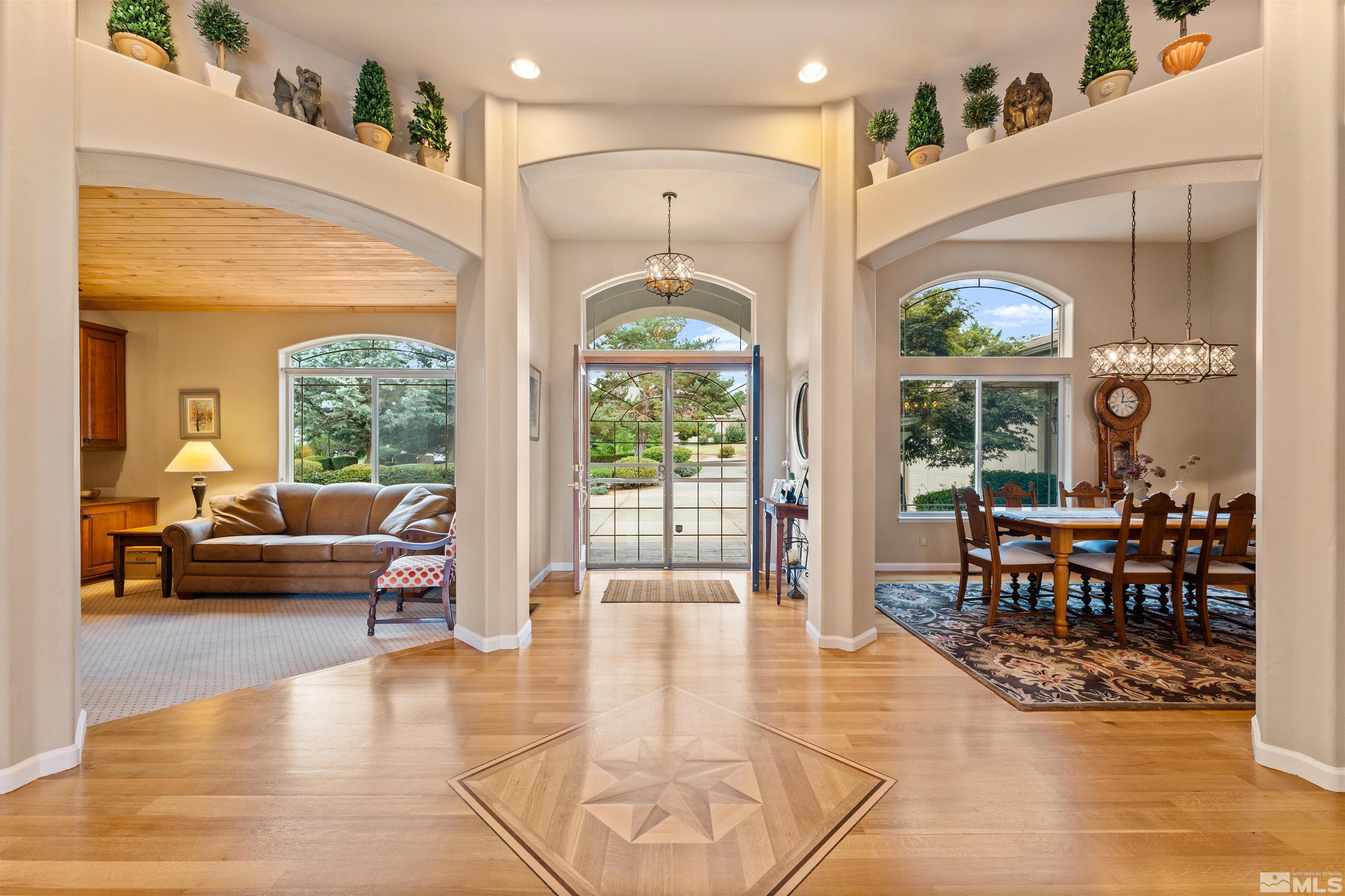 12875 Welcome Way Reno, NV 89511 - Photo 4 of 39 a lobby with furniture and floor to ceiling window