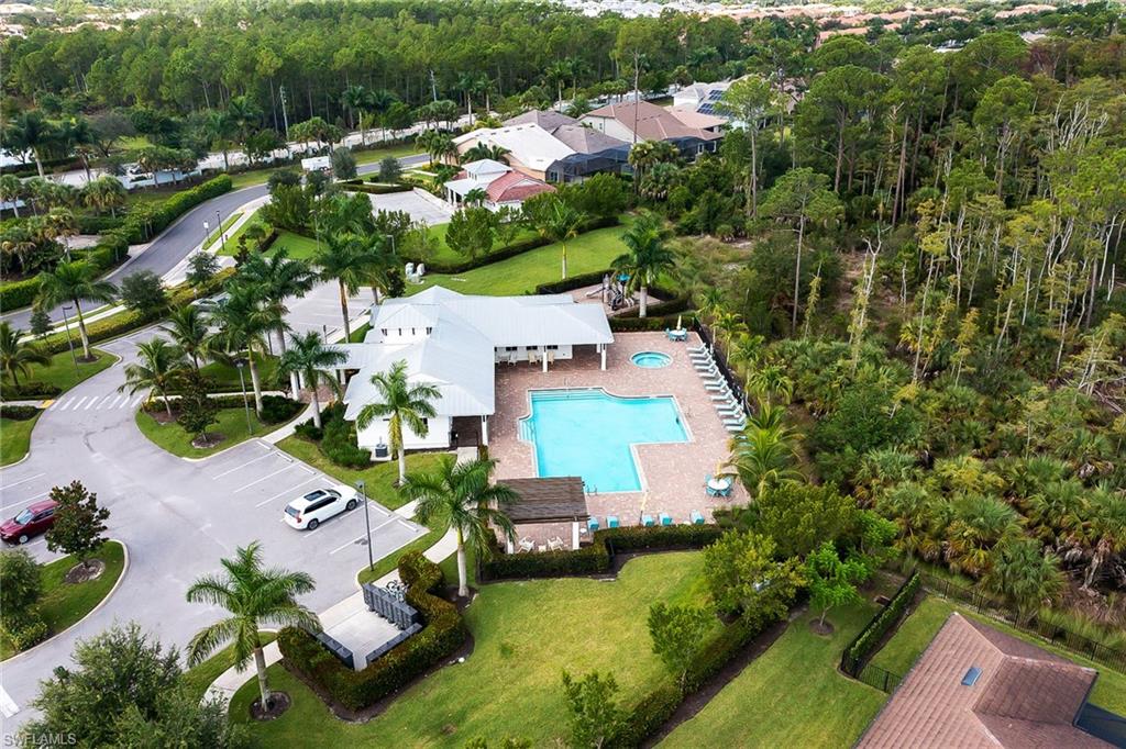 3668 Pilot Circle Naples, FL 34120 - Photo 27 of 29 an aerial view of a house with a garden