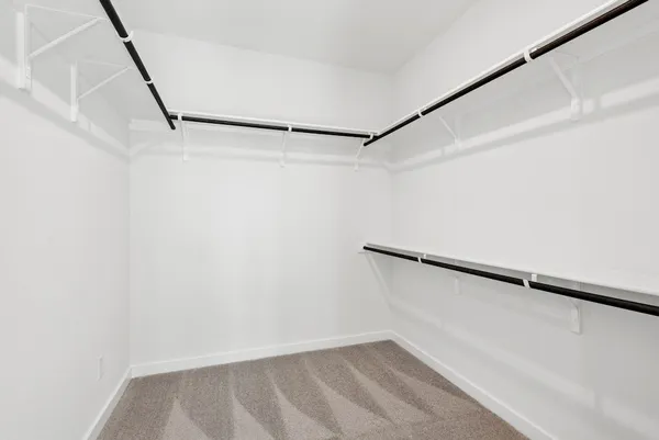 a view of an empty walk in closet