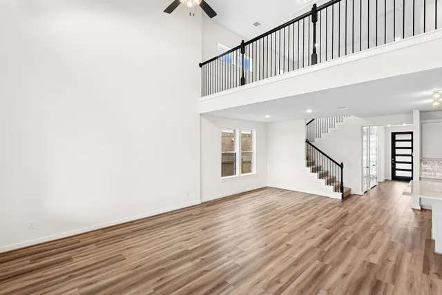 a view of an entryway with wooden floor