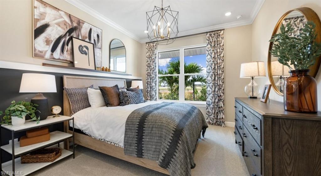 18073 Terracina Drive Fort Myers, FL 33913 - Photo 13 of 31 a spacious bedroom with a bed and a chandelier
