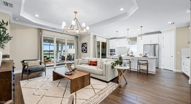 a spacious bedroom with a large bed and a dresser