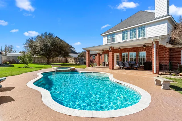 a view of outdoor space yard swimming pool and patio