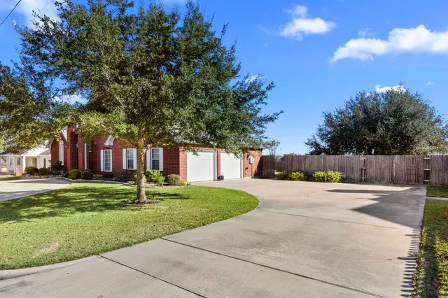 a house with garden in front of it