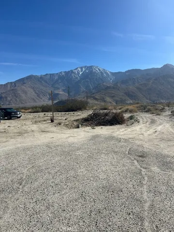 a view of a yard with mountain