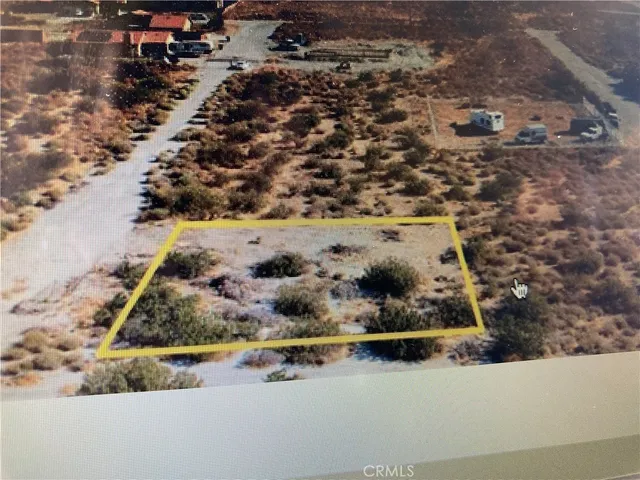 a view of a yard with mountain