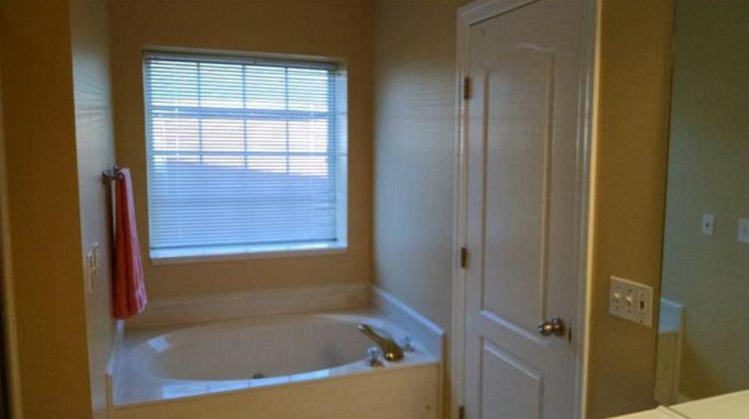 3119 Vera Valley Road Franklin, TN 37064 - Photo 14 of 20 a bathroom with a bathtub