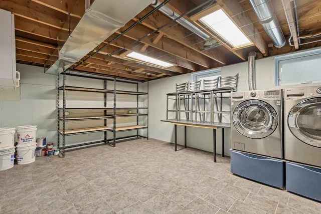 a view of a storage & utility room with racks
