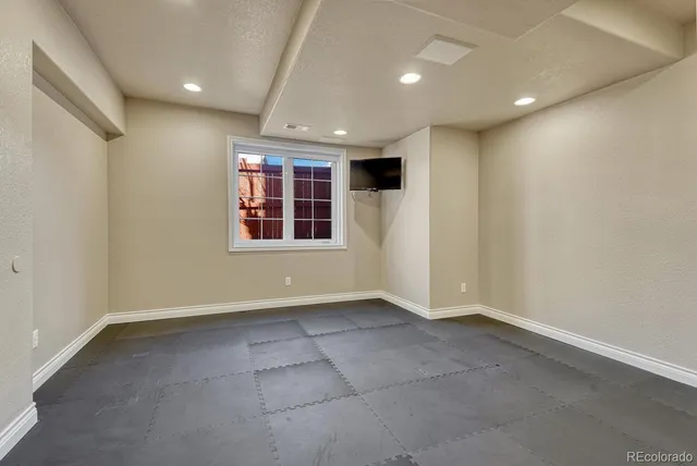 a view of empty room with windows